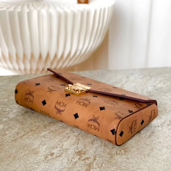 MCM Tan Monogram Clutch with Gold Accent - Picture 7 of 9